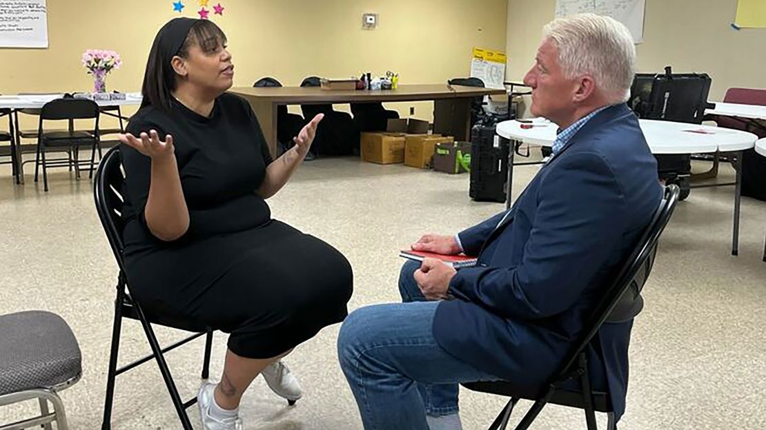 King speaks to BLOC executive director Angela Lang at the group's headquarters in Milwaukee in October.